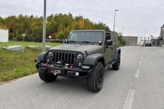 Jeep Wrangler mit Umbau und Raptor-Lackierug in Grün