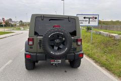 Jeep Wrangler mit Umbau und Raptor-Lackierug in Grün