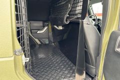 Jeep Wrangler mit Umbau und Raptor-Lackierug in Grün