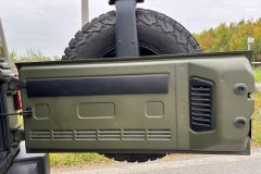 Jeep Wrangler mit Umbau und Raptor-Lackierug in Grün