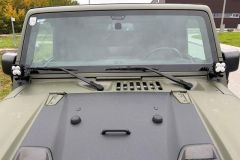 Jeep Wrangler mit Umbau und Raptor-Lackierug in Grün