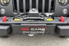 Jeep Wrangler mit Umbau und Raptor-Lackierug in Grün