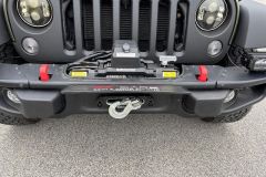 Jeep Wrangler mit Umbau und Raptor-Lackierug in Grün