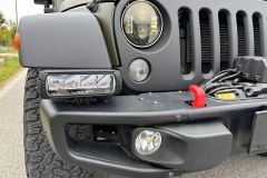 Jeep Wrangler mit Umbau und Raptor-Lackierug in Grün