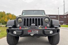 Jeep Wrangler mit Umbau und Raptor-Lackierug in Grün